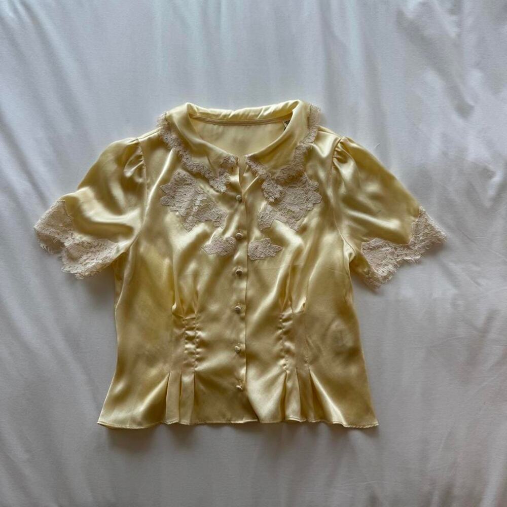 Yellow silk blouse with lace trim and embriodery detailing